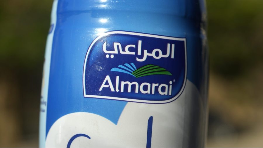 This image shows an Almarai logo in Cairo, Egypt, on Wednesday, April 26, 2023. Fondomonte Arizona, a subsidiary of Almarai Co., has for nearly a decade grown alfalfa in the American Southwest that is sent to the Gulf kingdom to feed cows there. Arizona rescinded a pair of drilling permits that would have allowed Fondomonte to pump up to 3,000 gallons of water per minute to irrigate its forage crops. (AP Photo/Amr Nabil)