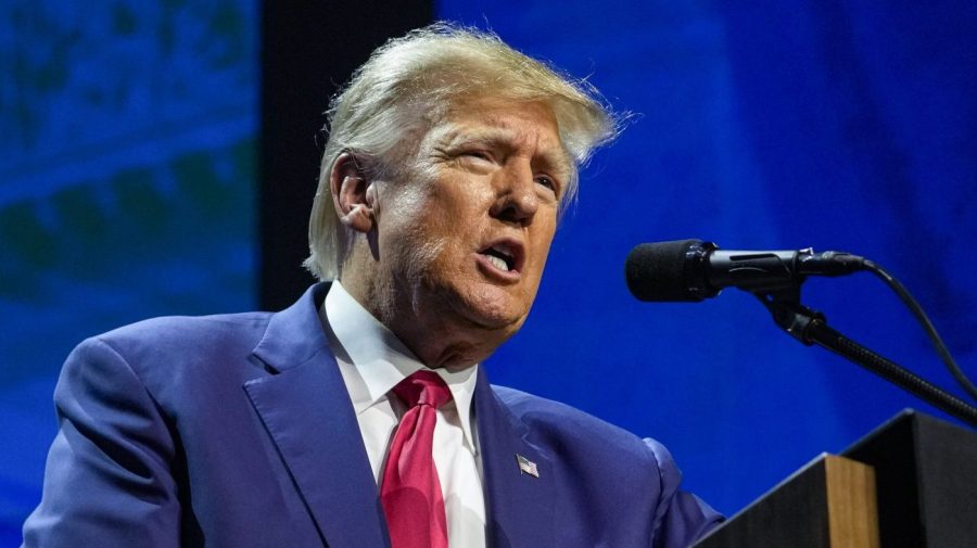 FILE - Former President Donald Trump speaks at the National Rifle Association Convention in Indianapolis, on April 14, 2023. The competition between Trump and Florida Gov. Ron DeSantis is intensifying as the former president is scheduling a return trip to Iowa on the same day that the Florida governor was already going to be in the state that will kick off the Republican contest for the White House. (AP Photo/Michael Conroy, File)