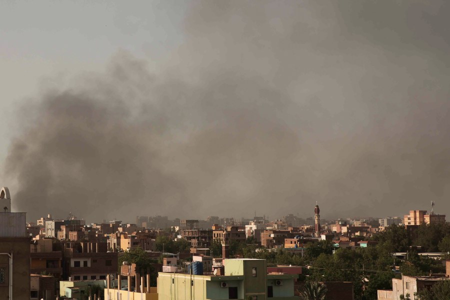 Smoke rises in Khartoum, Sudan, Saturday, April 29, 2023, as gunfire and heavy artillery fire continued despite the extension of a cease-fire between the country's two top generals. The battle for power between the country's army and its rival paramilitary has killed hundreds and sent thousands fleeing for their lives. (AP Photo/Marwan Ali)