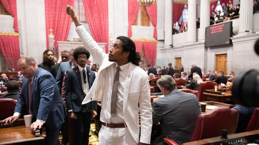 Former Rep. Justin Jones, D-Nashville, raises his fist on the floor of the House chamber as he walks to his desk to collect his belongings after being expelled from the legislature on Thursday, April 6, 2023, in Nashville, Tenn.