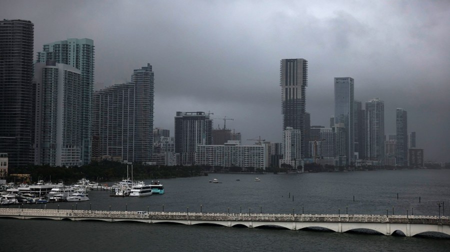 A haze sets over the city during a rain storm, Wednesday, April 12, 2023, in Miami. A torrential storm bought heavy showers, gusty winds and thunderstorms to South Florida on Wednesday and prompted the closure of Fort Lauderdale-Hollywood International Airport and the suspension of high-speed commuter rail service in the region.