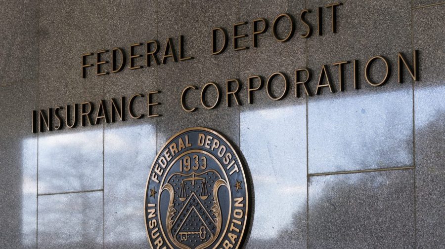 FILE - The Federal Deposit Insurance Corporation (FDIC) seal is shown outside its headquarters, March 14, 2023, in Washington. On Monday, May 1, the FDIC recommended that the U.S. rethink its decades-old policy of insuring up to $250,000 in bank deposits and replace it with an overhaul that would allow regulators to cover higher amounts on a “targeted” basis. (AP Photo/Manuel Balce Ceneta, File)