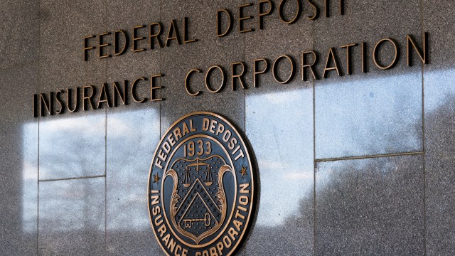 FILE - The Federal Deposit Insurance Corporation (FDIC) seal is shown outside its headquarters, March 14, 2023, in Washington. On Monday, May 1, the FDIC recommended that the U.S. rethink its decades-old policy of insuring up to $250,000 in bank deposits and replace it with an overhaul that would allow regulators to cover higher amounts on a “targeted” basis. (AP Photo/Manuel Balce Ceneta, File)