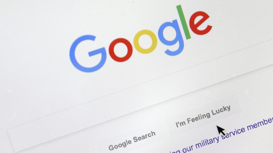 FILE - A cursor moves over Google's search engine page, Aug. 28, 2018, in Portland, Ore. Good news for all the password-haters out there: Google has taken a big step toward making them an afterthought by adding “passkeys” as a more straightforward and secure way to log into its services. (AP Photo/Don Ryan, File)