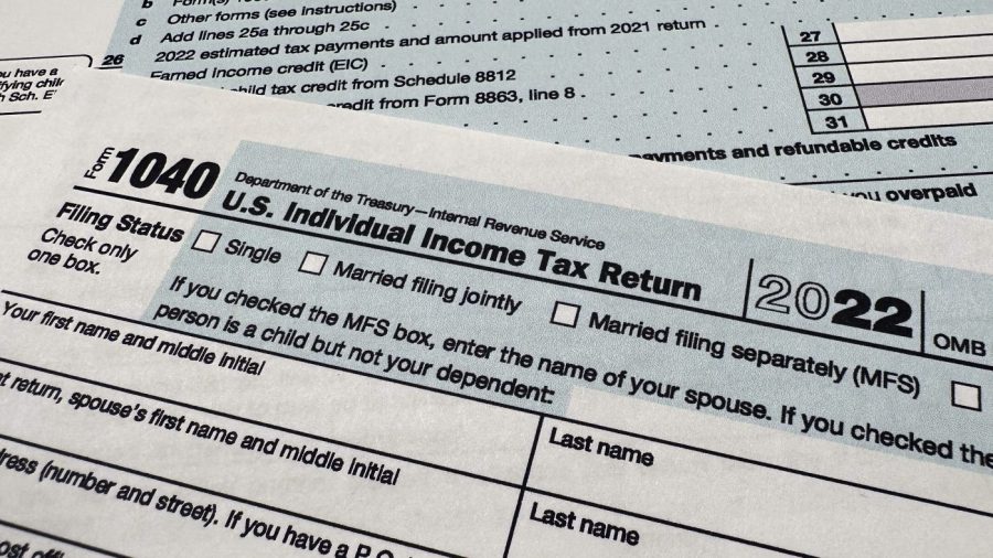 FILE - The Internal Revenue Service 1040 tax form for 2022 is seen on April 17, 2023. The IRS is planning to launch a pilot program for a government-run, online tax filing system that’s free for all. After months of research, the IRS published a feasibility report on Tuesday, May 16, 2023, laying out taxpayer interest in direct file, how the system could work, its potential cost, operational challenges and more. (AP Photo/Jon Elswick, File)