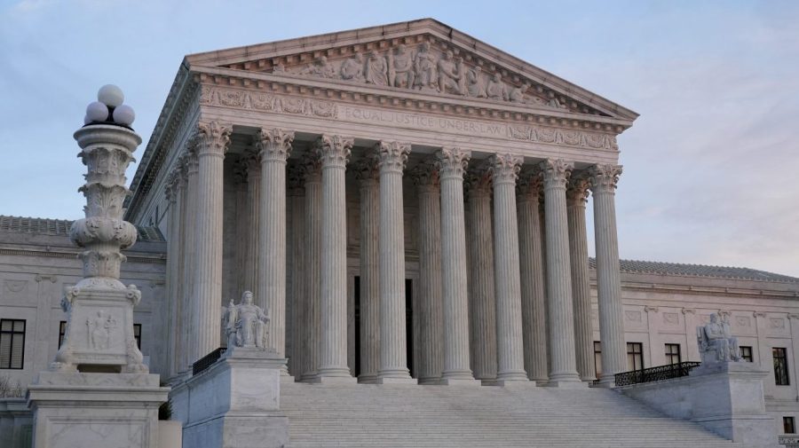 FILE - The setting sun illuminates the Supreme Court building on Capitol Hill in Washington, Jan. 10, 2023. The Supreme Court has agreed to decide whether South Carolina’s congressional districts need to be redrawn because they discriminate against Black voters. The justices said Monday they would review a lower-court ruling that found a coastal district running from Charleston to Hilton Head was intentionally redrawn to reduce the number of Black Democratic-leaning voters to make it more likely Republican candidates would win. (AP Photo/Patrick Semansky, File)