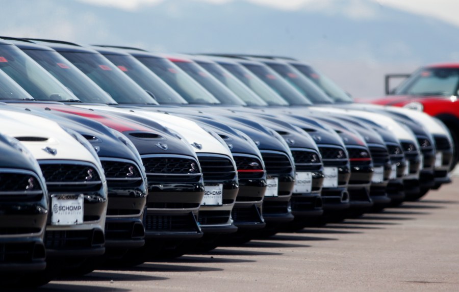 FILE - A line of unsold 2018 Cooper Clubmen sit in a long row at a Mini dealership, March 30, 2018, in Highlands Ranch, Colo. Lawmakers on Capitol Hill are pushing to keep AM radio in the nation's cars. A bipartisan group in Congress on Wednesday, May 17, 2023, introduced the “AM for Every Vehicle Act." The bill calls on the National Highway Traffic Safety Administration to require automakers to keep AM radio in new cars at no additional cost. (AP Photo/David Zalubowski, File)