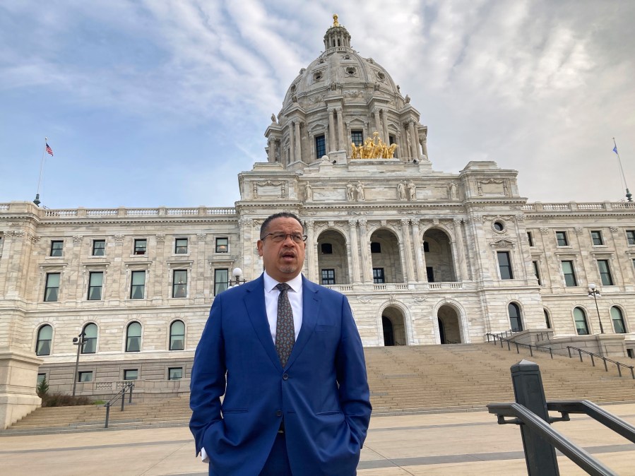 Minnesota Attorney General Keith Ellison stands outside the State Capitol in St. Paul, on Thursday, May 18, 2023, for an interview with The Associated Press on his new book, "Break the Wheel: Ending the Cycle of Police Violence," will be released Tuesday, May 23, 2023. Minnesota prosecutors were so worried a judge would move the murder trial of former Officer Derek Chauvin out of the city where he killed George Floyd that they conducted a mock trial in a deep red rural county to test their strategy, Ellison reveals in the new book. (AP Photo/Steve Karnowski)