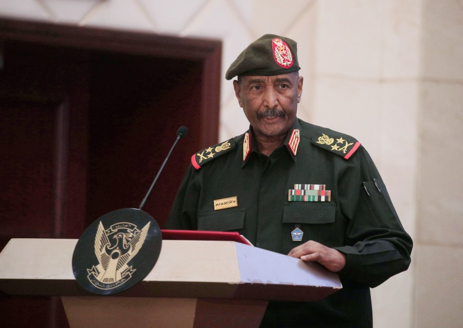 FILE - Sudan's Army chief Gen. Abdel-Fattah Burhan speaks following the signature of an initial deal aimed at ending a deep crisis caused by last year's military coup, in Khartoum, Sudan, Dec. 5, 2022. Burhan, Sudan’s top army general has fired the country's paramilitary leader, on Friday, May 19, 2023. (AP Photo/Marwan Ali, File)