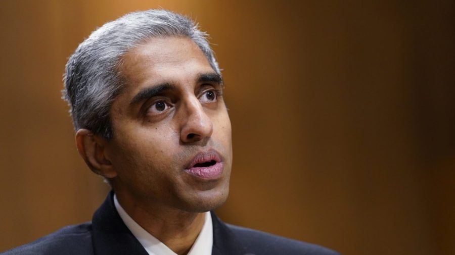 FILE - U.S. Surgeon General Dr. Vivek Murthy testifies before the Senate Finance Committee on Capitol Hill in Washington, on Feb. 8, 2022. The Surgeon General is warning there is not enough evidence to show that social media is safe for young people — and is calling on tech companies, parents and caregivers to take "immediate action to protect kids now." (AP Photo/Susan Walsh, File)