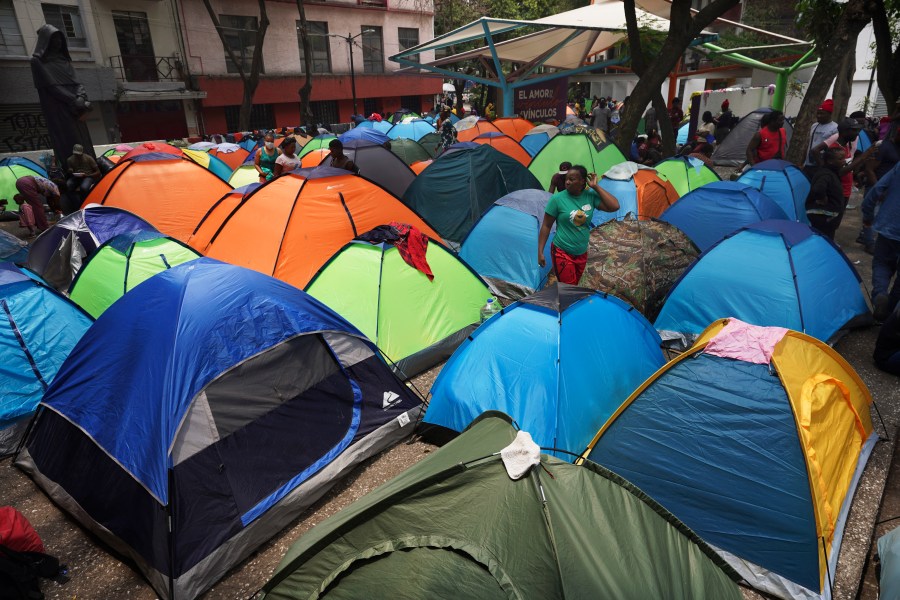 FILE - Haitian migrants camp out at the Giordano Bruno plaza in Mexico City, May 18, 2023. The group was staying at a shelter in Mexico City on their way north but were forced to make camp at the park after the shelter closed. (AP Photo/Marco Ugarte, File)