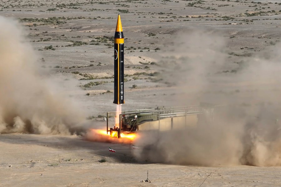 In this picture released by the Iranian Defense Ministry on Thursday, May 25, 2023, Khorramshahr-4 missile is launched at an undisclosed location, Iran. Iran unveiled on Thursday what it dubbed the latest iteration of its liquid-fueled Khorramshahr ballistic missile amid wider tensions with the West over its nuclear program. (Iranian Defense Ministry via AP)