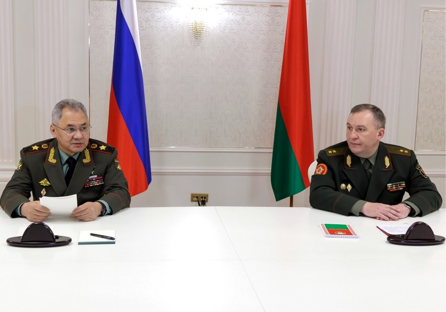 Russian Defense Minister Sergei Shoigu, left, and Belarusian Defense Minister Viktor Khrenin speak to the media after a session of the Council of Defense Ministers of the Collective Security Treaty Organization (CSTO) in Minsk, Belarus, Thursday, May 25, 2023. (Vadim Savitsky/Russian Defense Ministry Press Service via AP)