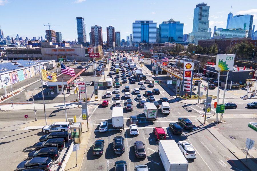 FILE - People wait to drive through the Holland Tunnel into New York City during morning rush hour traffic in Jersey City, New Jersey, on Wednesday, March 8, 2023. The failure of several large lenders in early 2023 and the banking turmoil that followed have fueled worries for owners of office space. (AP Photo/Ted Shaffrey, File)