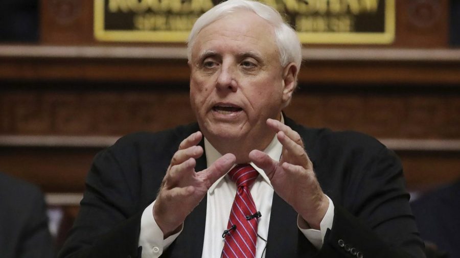 West Virginia Gov. Jim Justice gestures while delivering an address at the statehouse.