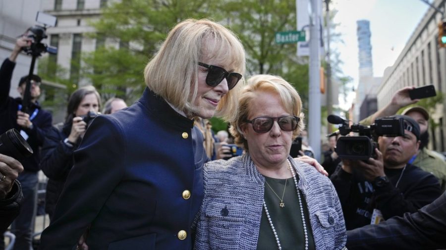 Former advice columnist E. Jean Carroll, left, departs Manhattan federal court, Monday, May 1, 2023, in New York.