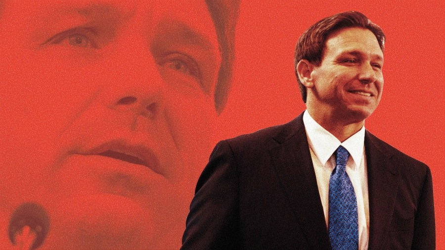 Photo illustration of Ron DeSantis smiling, far right, with a close-up of his face (low opacity) speaking into a microphone on a red-toned background.