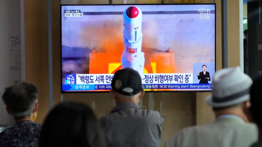 A TV screen shows a file image of North Korea's rocket launch during a news program at the Seoul Railway Station in Seoul, South Korea, Wednesday, May 31, 2023. North Korea launched a purported rocket Wednesday, a day after the country announced a plan to put its first military spy satellite into orbit, South Korea's military said.