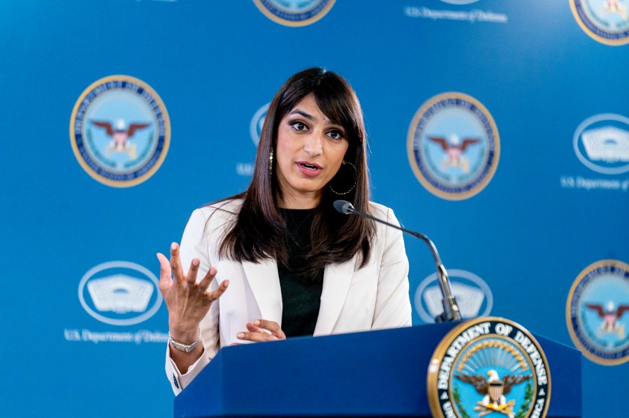 Sabrina Singh gestures while speaking at a press conference in 2023.