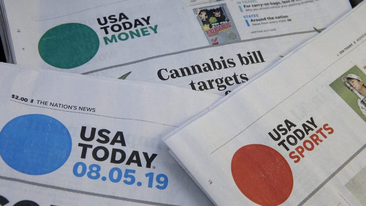 FILE - Sections of a USA Today newspaper are displayed Aug. 5, 2019, in Norwood, Mass. Journalists across the U.S. will walk off their jobs next week at publications owned by Gannett, the largest newspaper chain in the U.S. The mostly one-day strike, which will start Monday, June 5, 2023, aims to protest the company’s leadership and cost-cutting measures imposed since its 2019 merger with GateHouse Media. (AP Photo/Steven Senne, File)