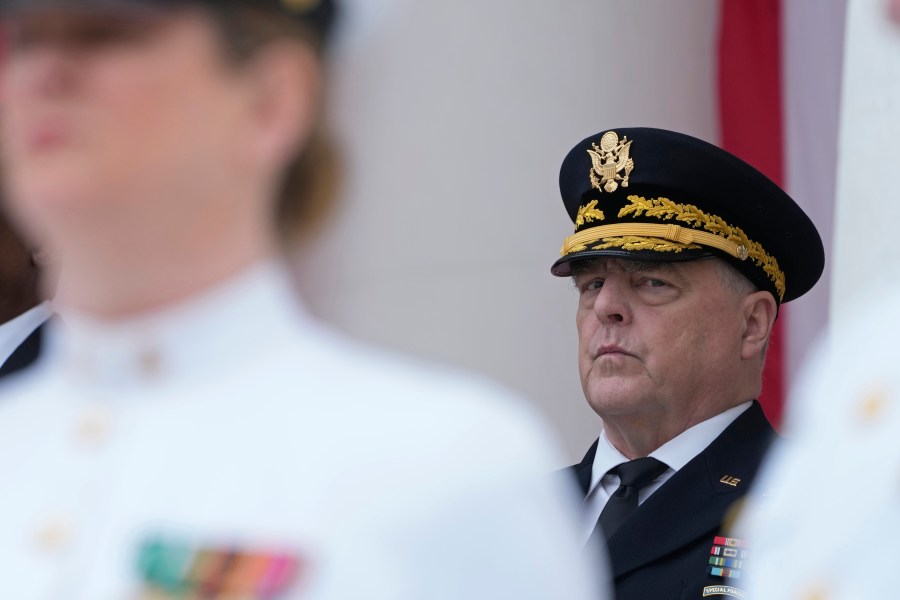 FILE - Chairman of the Joint Chiefs of Staff Gen. Mark Milley listens during an event at the Memorial Amphitheater of Arlington National Cemetery in Arlington, Va., on Memorial Day, on May 29, 2023. The chairman of the Joint Chiefs of Staff, Gen. Mark Milley, says the main battle tanks and fighter jets the U.S. has promised to Ukraine won’t be ready in time for the imminent counteroffensive against Russia. Tank warfare will be key to Ukraine pushing Russia out of its territory, and the U.S. has begun training Ukrainian troops on M1A1 Abrams battle tank tactics. (AP Photo/Susan Walsh, File)