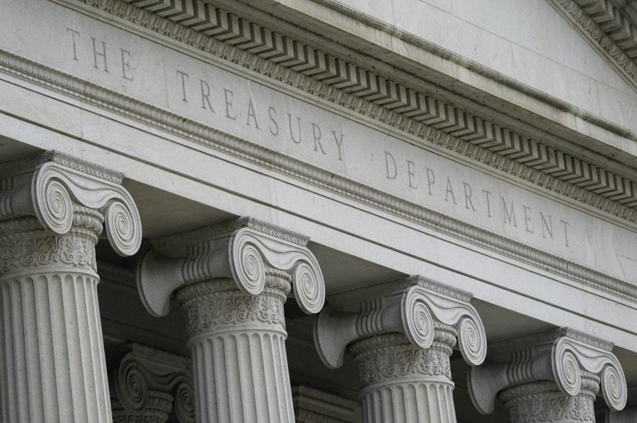 FILE - The Treasury Building is viewed in Washington, May 4, 2021. The United States has announced sanctions against a group of Iranian and Turkish people and firms accused of plotting to assassinate former U.S. government officials, dual U.S. and Iranian nationals, and dissidents. Several alleged assassination plots have been uncovered in recent years. (AP Photo/Patrick Semansky, File)