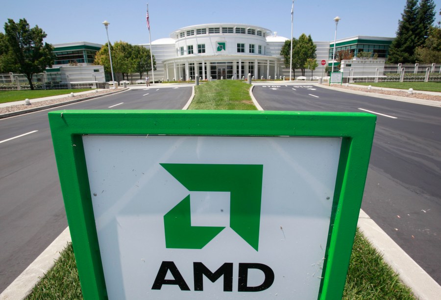 FILE - This July 13, 2010, file photo, shows an entrance to the Advanced Micro Devices Inc. (AMD) headquarters in Sunnyvale, Calif. Advanced Micro Devices has revealed a new artificial intelligence chip in its race to compete with rival chipmaker Nvidia in supplying the foundation for a boom in AI-fueled business tools. The semiconductor company described its new MI300X chip as “the world’s most advanced accelerator for generative AI.” It's expected to attract interest from big cloud providers such as Amazon or Microsoft, but AMD hasn't specified which cloud provider might use it. (AP Photo/Paul Sakuma, File)