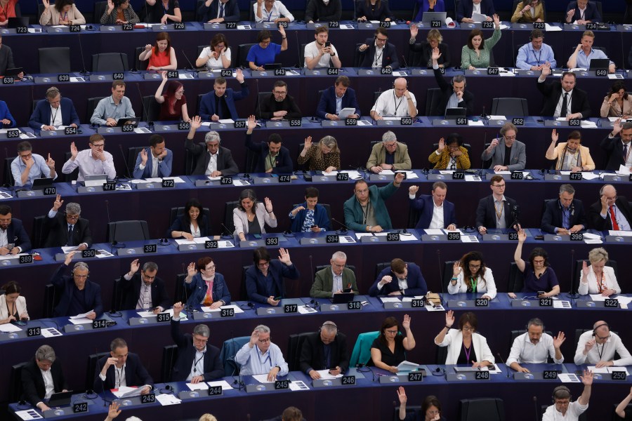 Lawmakers vote on the Artificial Intelligence act Wednesday, June 14, 2023 at the European Parliament in Strasbourg, eastern France. Authorities worldwide are racing to rein in artificial intelligence, including in the European Union, where groundbreaking legislation is set to pass a key hurdle Wednesday. European Parliament lawmakers are due to vote on the proposal — including controversial amendments on facial recognition. (AP Photo/Jean-Francois Badias)