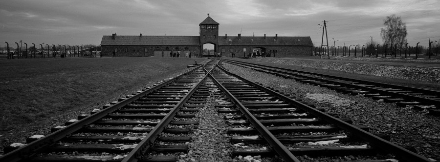 FILE - The railway tracks where hundred thousands of people arrived to be directed to the gas chambers inside the former Nazi death camp of Auschwitz Birkenau, or Auschwitz II, are pictured in Oswiecim, Poland, Saturday, Dec. 7, 2019. The organization that handles claims on behalf of Jews who suffered under the Nazis says that Germany has agreed extend compensation for Holocaust survivors around the globe for the coming year. (AP Photo/Markus Schreiber, file)