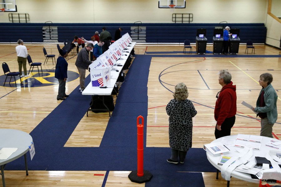 FILE - Voters fill out their ballots at a primary polling place, Feb. 29, 2020, in North Charleston, S.C. South Carolina Republicans have set Feb. 24 as the date of their 2024 presidential primary, a move that, if approved, the party says will give GOP White House hopefuls more time to campaign in the first-in-the-South state. (AP Photo/Patrick Semansky, File)