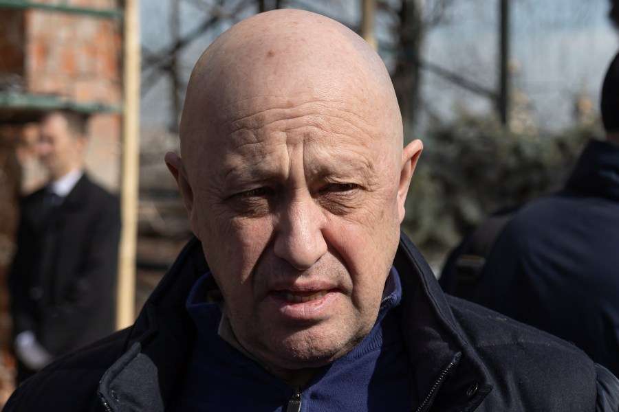 FILE - Yevgeny Prigozhin, the owner of the Wagner Group military company, arrives during a funeral ceremony at the Troyekurovskoye cemetery in Moscow, Russia, on April 8, 2023. On Friday, June 23, Prigozhin made his most direct challenge to the Kremlin yet, calling for an armed rebellion aimed at ousting Russia’s defense minister. The security services reacted immediately by calling for his arrest. (AP Photo/File)