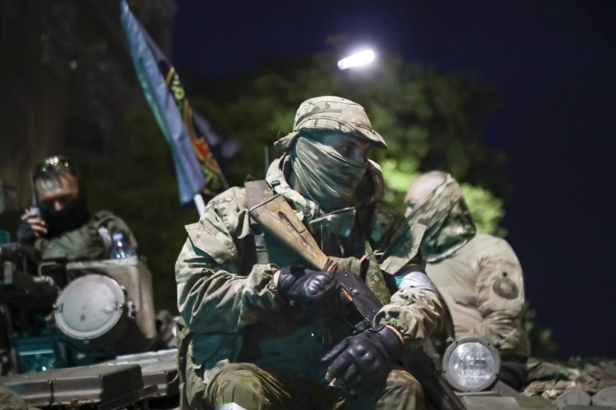 Members of the Wagner Group military company sit atop a tank on a street in Rostov-on-Don, Russia, Saturday, June 24, 2023, prior to leaving an area at the headquarters of the Southern Military District. Kremlin spokesman Dmitry Peskov said that Yevgeny Prigozhin's troops who joined him in the uprising will not face prosecution and those who did not will be offered contracts by the Defense Ministry. After the deal was reached Saturday, Prigozhin ordered his troops to halt their march on Moscow and retreat to field camps in Ukraine, where they have been fighting alongside Russian troops. (AP Photo)