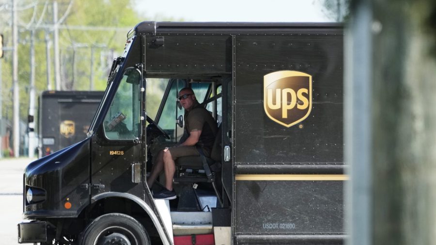 File - A UPS truck makes deliveries in Northbrook, Ill., Wednesday, May 10, 2023. Frustrated by what he called an "appalling counterproposal" earlier this week, the head of the union representing 340,000 UPS workers said a strike now appears inevitable and gave the shipping giant a Friday deadline to improve its offer. (AP Photo/Nam Y. Huh)