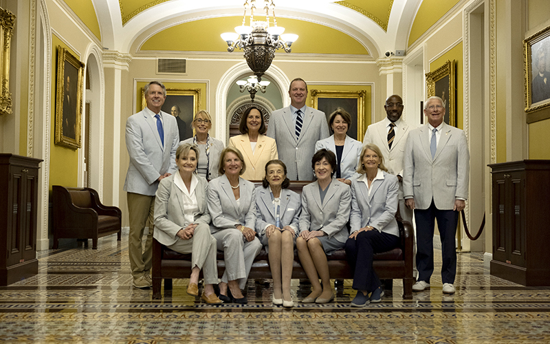 Senators pose for the annual Seersucker Thursday photo