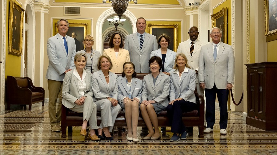 Senators pose for the annual Seersucker Thursday photo