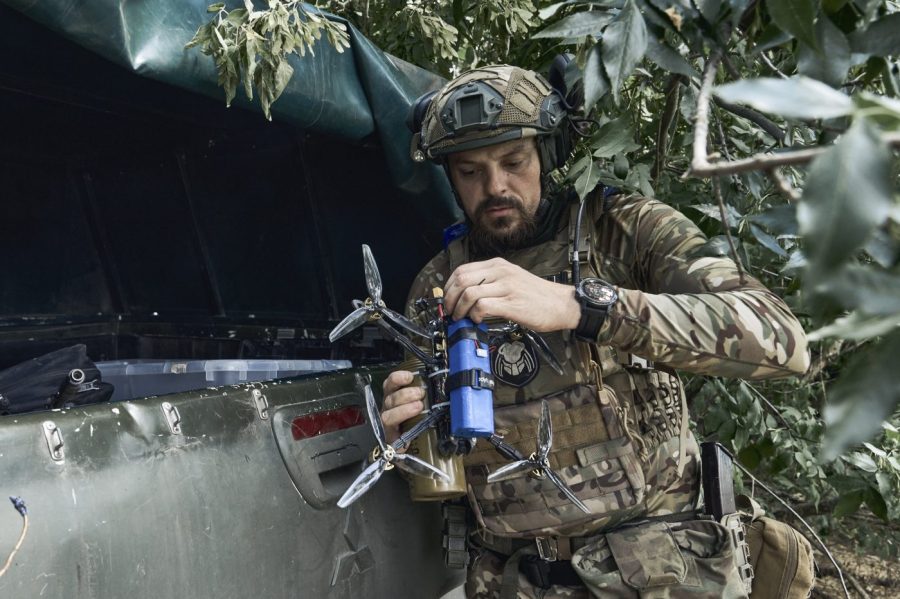 A Ukrainian soldier prepares a drone on the frontline in the Zaporizhzhia region, Ukraine, Saturday, July 1, 2023. (AP Photo/Libkos)