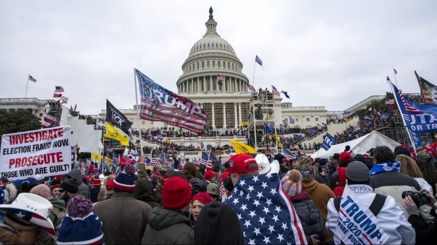 FILE - Rioters loyal to President Donald Trump rally at the U.S. Capitol in Washington on Jan. 6, 2021. (AP Photo/Jose Luis Magana, File)