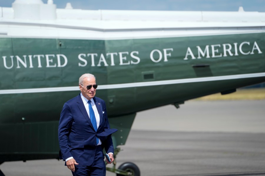 US President Joe Biden walks backdropped by Marine One upon arriving at Stansted airport, in London, Monday, July 10, 2023. (AP Photo/Susan Walsh)