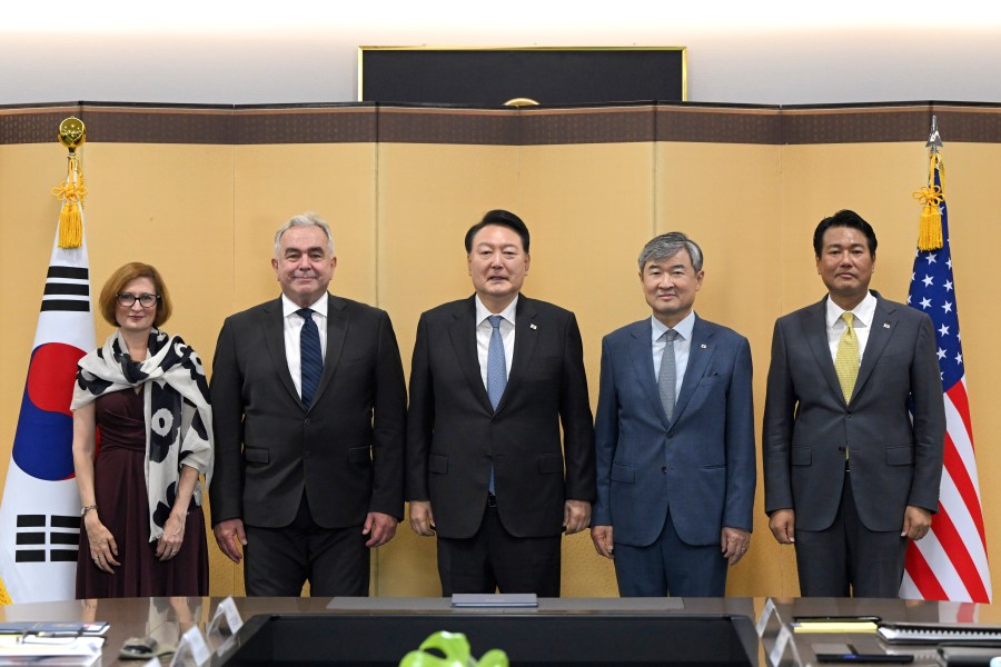 In this photo provided by South Korea Presidential House via Yonhap, from left to right, U.S. Assistant Secretary of Defense for Acquisition Cara Abercrombie, U.S. National Security Coordinator for the Indo Pacific Affairs Kurt Campbell, South Korean President Yoon Suk Yeol, South Korea's National Security Adviser Cho Tae-yong and South Korea's deputy national security director Kim Tae-hyo pose for photo during a meeting of the Nuclear Consultative Group between South Korea and the United States at the presidential house in Seoul, South Korea, Tuesday, July 18, 2023. (South Korea Presidential House/ Yonhap via AP)