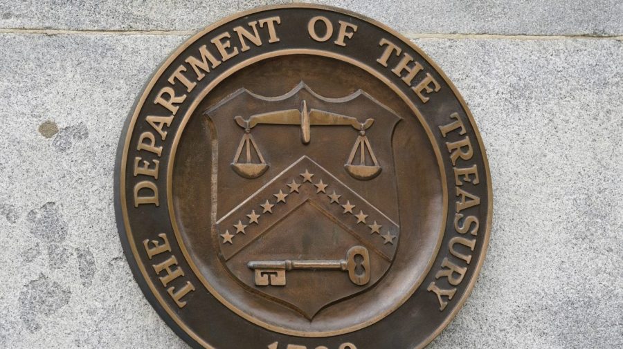 FILE - The Department of the Treasury's seal outside the Treasury Department building in Washington on May 4, 2021. The U.S. on Thursday, July 20, 2023, imposed sanctions on roughly 120 firms and people from Russia to the United Arab Emirates to Kyrgyzstan in an effort to choke off Moscow's access to products, money and financial channels that support its invasion of Ukraine. (AP Photo/Patrick Semansky, File)