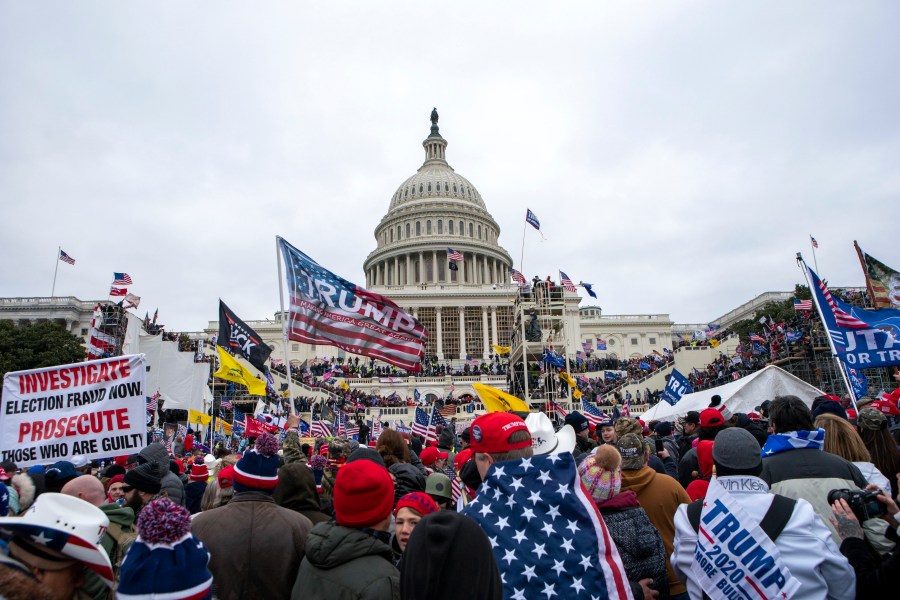 FILE - Insurrectionists loyal to President Donald Trump breach the U.S. Capitol in Washington on Jan. 6, 2021. A security operations leader for the far-right Oath Keepers group has been sentenced on Friday, July 21, 2023, to two years of probation. Michael Greene's acquittal on conspiracy charges in the Jan. 6, 2021, Capitol riot had marked a rare setback for prosecutors. (AP Photo/Jose Luis Magana, File)