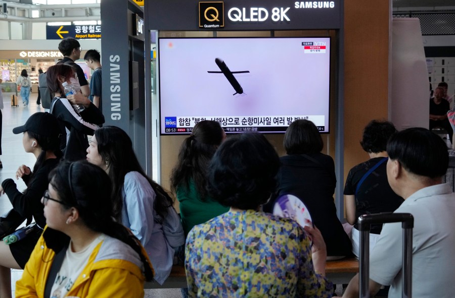 A TV screen shows a file image of North Korea's missile launch during a news program at the Seoul Railway Station in Seoul, South Korea, Saturday, July 22, 2023. North Korea fired several cruise missiles toward its western sea Saturday, South Korea's military said, marking the second launch event this week apparently in protest of the docking of a nuclear-armed U.S. submarine in South Korea. (AP Photo/Ahn Young-joon)