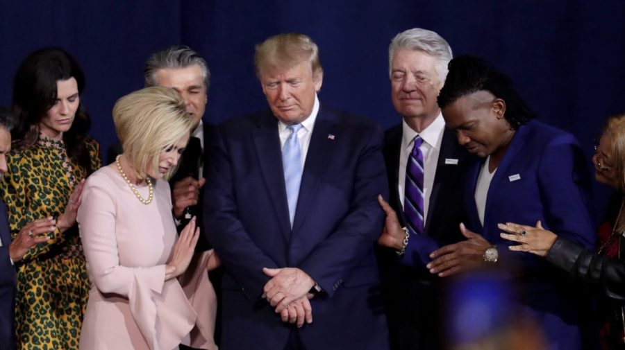 FILE - Pastor Paula White, left, and other faith leaders pray with President Donald Trump, center, during a rally for evangelical supporters at the King Jesus International Ministry church, Friday, Jan. 3, 2020, in Miami.