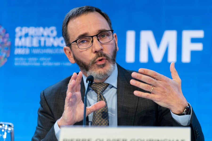 FILE - International Monetary Fund Director of the Research Department Pierre-Olivier Gourinchas speaks at a news conference during the World Bank/IMF Spring Meetings at the International Monetary Fund (IMF) headquarters in Washington, April 11, 2023. The International Monetary Fund is projecting that global economic growth will see a slight improvement compared to its previous projections but cautions that many challenges still cloud the horizon. (AP Photo/Jose Luis Magana. File)