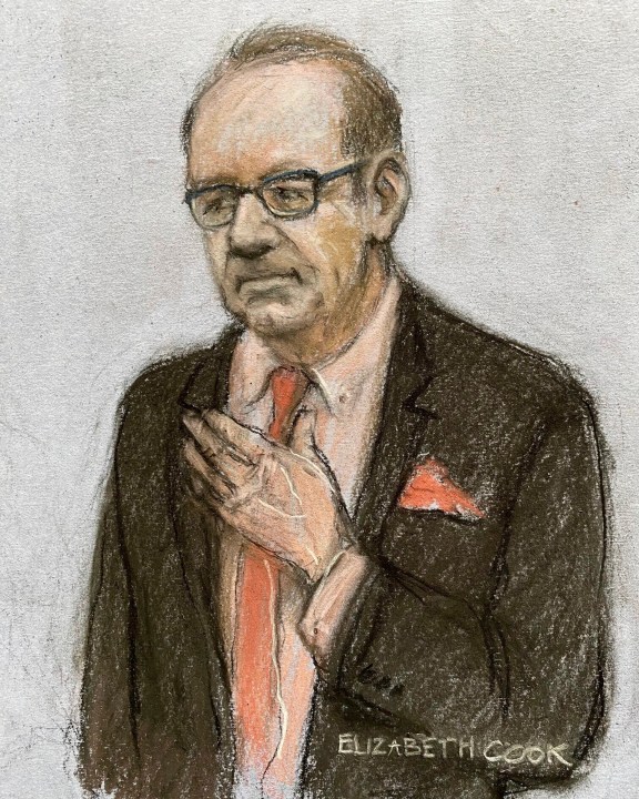 This court artist sketch by Elizabeth Cook shows actor Kevin Spacey appearing at Southwark Crown Court, London, Wednesday July 26, 2023. A London jury has acquitted Kevin Spacey on sexual assault charges stemming from allegations by four men dating back 20 years. Jurors returned their verdicts Wednesday in Southwark Crown Court after deliberating over three days. (Elizabeth Cook/PA via AP)