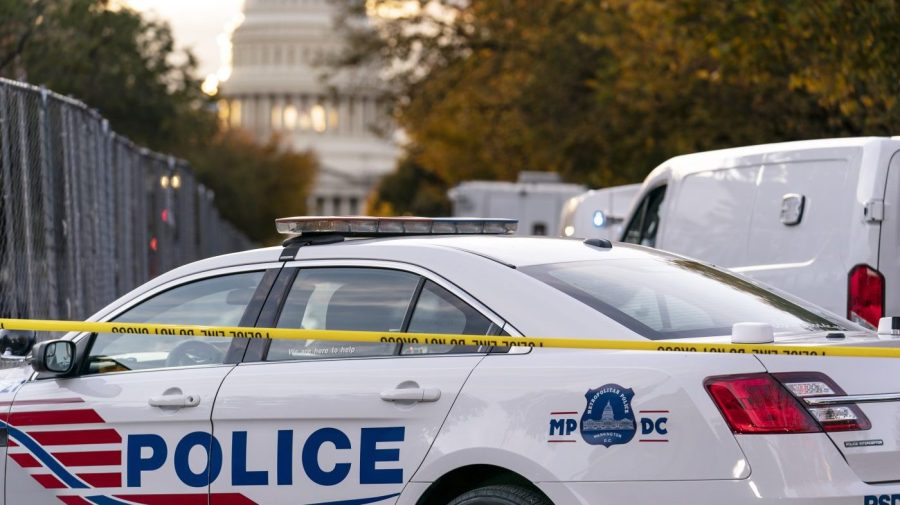 FILE - Washington Metropolitan Police near Supreme Court. (AP Photo/J. Scott Applewhite, File)