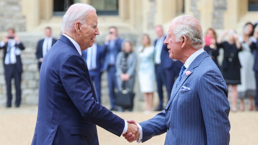 U.S. President Joe Biden, left, shakes hands with Britain's King Charles III and as they meet at Windsor Castle, England, Monday July 10, 2023.