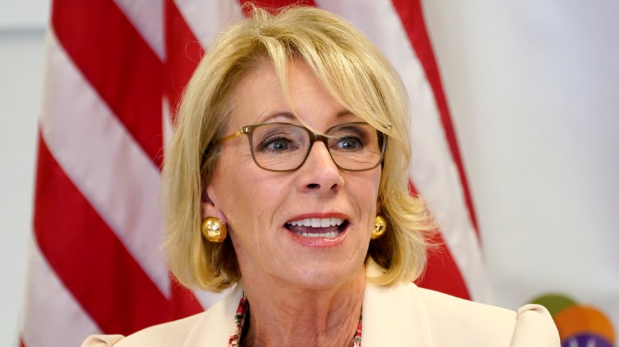 In this Oct. 15, 2020, file photo, then-Secretary of Education Betsy DeVos speaks at the Phoenix International Academy in Phoenix.