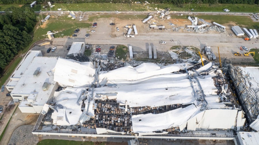 Debris is scattered around the Pfizer facility on Wednesday, July 19, 2023, in Rocky Mount, N.C., after damage from severe weather.