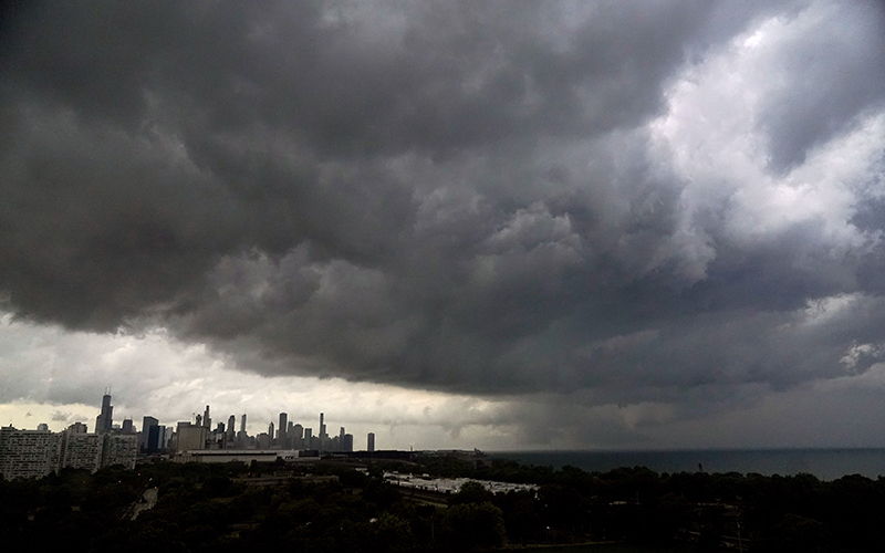 Storm clouds pass over downtown Chicago heading East out over Lake Michigan